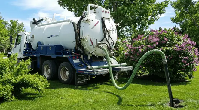 Professional vacuum truck performing residential drainage and septic maintenance in Pasadena, CA